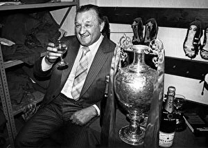 Award Ceremonies Gallery: Liverpool manager Bob Paisley celebrates with a glass of champagne in the boot room at