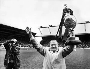 Award Ceremonies Gallery: Liverpool manager Bob Paisley celebrates with the League Championship trophy at Anfield