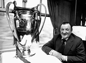 Achievement Gallery: Liverpool manager Bob Paisley withthe European Cup trophy sitting on a train following