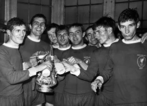 Liverpool players enjoy a drink after winning FA Cup final against Leeds United (2-1) Liverpool players enjoy a drink after winning FA Cup final against Leeds United (2-1)