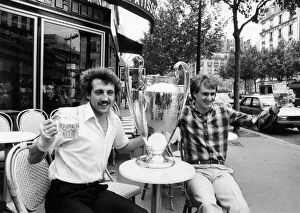 Images Dated 28th May 1981: Liverpool players Phil Thompson and Alan Kennedy celebrate with the European Cup after