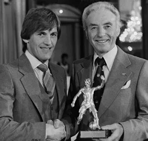 Liverpool star Kenny Dalglish recieves the Footballer of the year award from Stanley