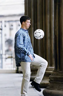 Images Dated 7th April 1995: Liverpool striker Robbie Fowler showing off his ball skills at St Georges Hall