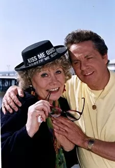 Images Dated 30th June 1994: Liz Dawn actress wearing a Kiss Me Quick hat with David Ross