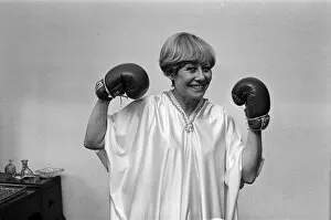Images Dated 7th May 1982: Liz Dawn aka Vera Duckworth of Coronation Street fame wearing boxing gloves. 7th May 1982