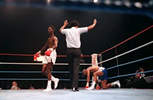 Lloyd Honeyghan boxer knocked down by Breland Mar 90 with boxing referee arms Lloyd Honeyghan boxer knocked down by Breland Mar 90 with boxing referee arms