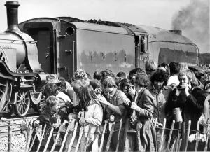 LNER Engine No. 4498 the Sir Nigel Gresley, and a Stirling steam locomotive making their LNER Engine No. 4498 the Sir Nigel Gresley, and a Stirling steam locomotive making their