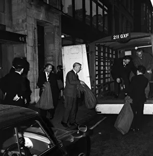 Loading sacks of mail from the post office into a van, ready for delivery Loading sacks of mail from the post office into a van, ready for delivery