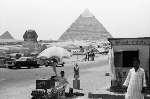 Two local egyptians seen here at the Great Pyramid and Sphinx of Giza selling postcards Two local egyptians seen here at the Great Pyramid and Sphinx of Giza selling postcards