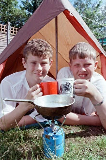 Images Dated 4th July 1990: A local Scout has been camping out since the beginning of February in a bid to win a trip
