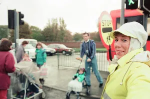 Images Dated 9th November 1995: Lollipop lady Janet Taylor on duty at the junction of Trunk Road with Kings Road