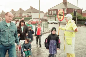 Images Dated 9th November 1995: Lollipop lady Janet Taylor on duty at the junction of Trunk Road with Kings Road