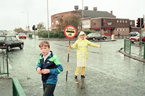 Images Dated 9th November 1995: Lollipop lady Janet Taylor on duty at the junction of Trunk Road with Kings Road