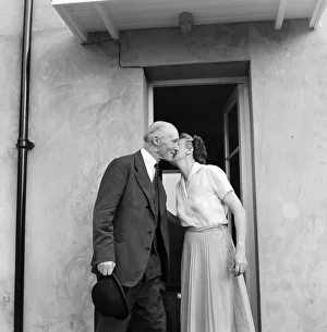 Lord Denning kisses his wife at their home in Whitchurch before leaving for London to Lord Denning kisses his wife at their home in Whitchurch before leaving for London to