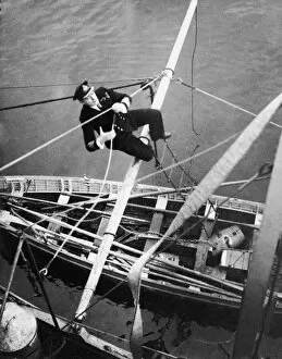Images Dated 14th December 2011: Lord Louis Mountbatten, comes aboard in an uncoventional manner, circa March 1941