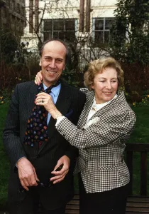 Lord Norman Tebbit with Dame Vera Lynn receives a tie after being named Tiewearer of Lord Norman Tebbit with Dame Vera Lynn receives a tie after being named Tiewearer of