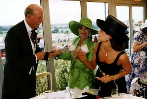 Images Dated 10th June 1992: Lord White of Hull Chairman of Hanson Industries with his girlfriend
