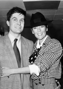 Occupation M Gallery: Lorraine Chase actress and model with her boyfriend John Knight November 1983