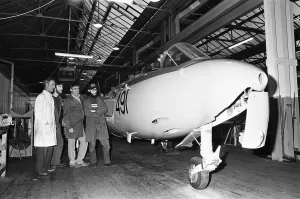 A lovingly restored Seahawk Hawker jet fighter is checked over by workers at the city A lovingly restored Seahawk Hawker jet fighter is checked over by workers at the city
