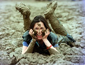 Lucy Rock enjoying the mud at Glastonbury festival June 1997 Lucy Rock enjoying the mud at Glastonbury festival June 1997