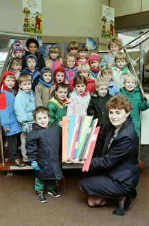 Images Dated 4th February 1991: Luke Walker, from Marsden Nursery School, is seen with classmates who visited W H Smith