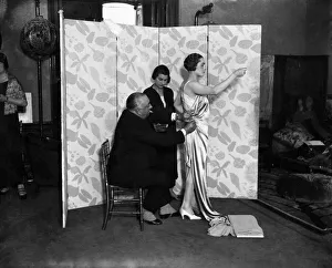 M. Paul Poiret designing a gown on one of his mannequins. December 1924 P008637 M. Paul Poiret designing a gown on one of his mannequins. December 1924 P008637