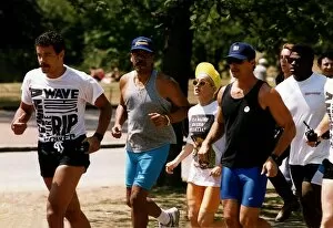 Images Dated 18th July 1990: Madonna Pop Singer goes running with her eight minders in Hyde Park