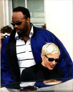 Madonna Singer Actress with burly minder leaving Lanesboruogh hotel Madonna Singer Actress with burly minder leaving Lanesboruogh hotel
