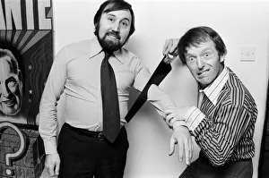 00916 Gallery: Magician Paul Daniels shows off a trick as he cuts Ken Irwins arm off