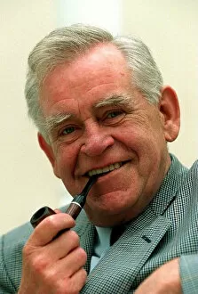 Images Dated 25th August 1997: Magnus Magnusson TV Presenter Quiz Master August 1997 smoking pipe at the launch of