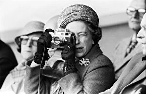1981 Gallery: Her Majesty Queen Elizabeth II taking a picture at the Royal Windsor Horse Trials