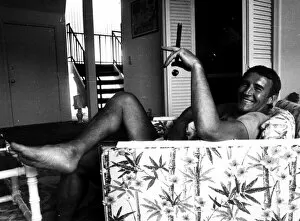 Malcolm Allison football manager 1976 sitting in armchair smoking large cigar