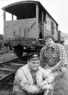 Malcolm Brown left, and Gordon Bainbridge, beside a fire damaged guards van Malcolm Brown left, and Gordon Bainbridge, beside a fire damaged guards van