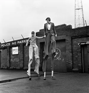 Malcolm Parry, 14, of Gorton, Manchester, is learning stiltwalking with his friend who is Malcolm Parry, 14, of Gorton, Manchester, is learning stiltwalking with his friend who is