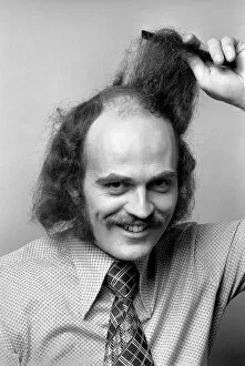 Man combing his hair. July 1975 75-00177-004