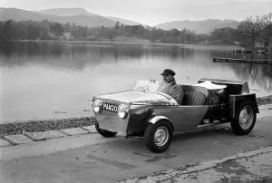 Man driving a steam powered out in the countryside December 1970 Man driving a steam powered out in the countryside December 1970