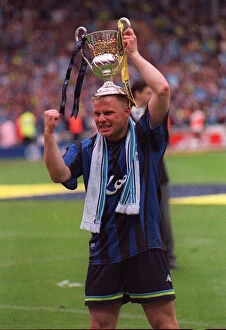Images Dated 30th May 1999: Manchester City captain Andy Morrison May 1999 celebrates with trophy