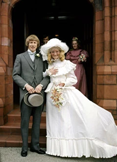 Manchester City footballer Colin Bell with his bride Marie Holmes after their wedding at