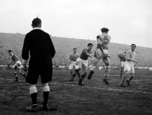 Manchester City versus Manchester United-Tommy Taylor tries a header through Manchester Manchester City versus Manchester United-Tommy Taylor tries a header through Manchester