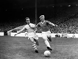 Core61 Gallery: Manchester Citys Hannah in a race for the ball with Quixall of Manchester United