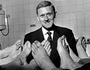 Manchester City's physiotherapist Peter Blakey inspects the feet of Manchester City Manchester City's physiotherapist Peter Blakey inspects the feet of Manchester City