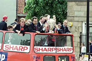 Images Dated 27th May 1999: Manchester United celebrate winning the treble as the jubilant team make their way