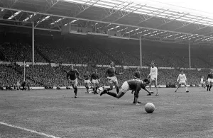 Manchester United defence watch the ball go to safety during the Manchester United Manchester United defence watch the ball go to safety during the Manchester United