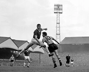Core61 Gallery: Manchester United defender Bill Foulkes jumps up for a high ball with Broadbent of