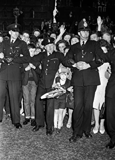 Manchester United fans await the team returning from Wembley with the FA Cup May Manchester United fans await the team returning from Wembley with the FA Cup May