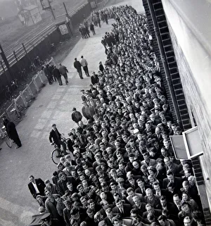 Core61 Gallery: Manchester United fans queue for tickets at Old Trafford for the FA Cup semi final match