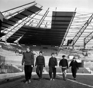 Manchester United Football Players training under the new cantilever stand at Old Manchester United Football Players training under the new cantilever stand at Old
