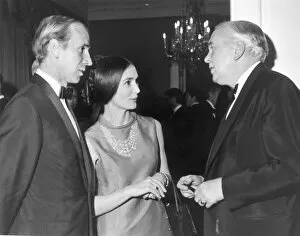 00243 Gallery: Manchester United footballer Bobby Charlton with his wife Norma talking to Prime Minister