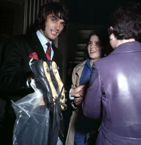 Manchester United footballer George Best carrying his boots September 1969 Manchester United footballer George Best carrying his boots September 1969