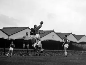 Core61 Gallery: Manchester United goalkeeper Harry Gregg claims a high ball in his penalty area during
